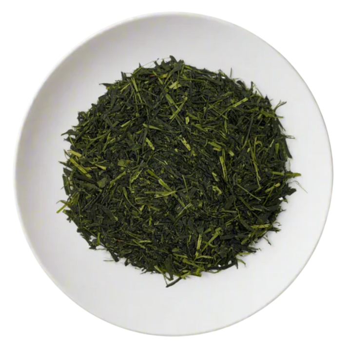 Gyokuro tea leaves on a white plate