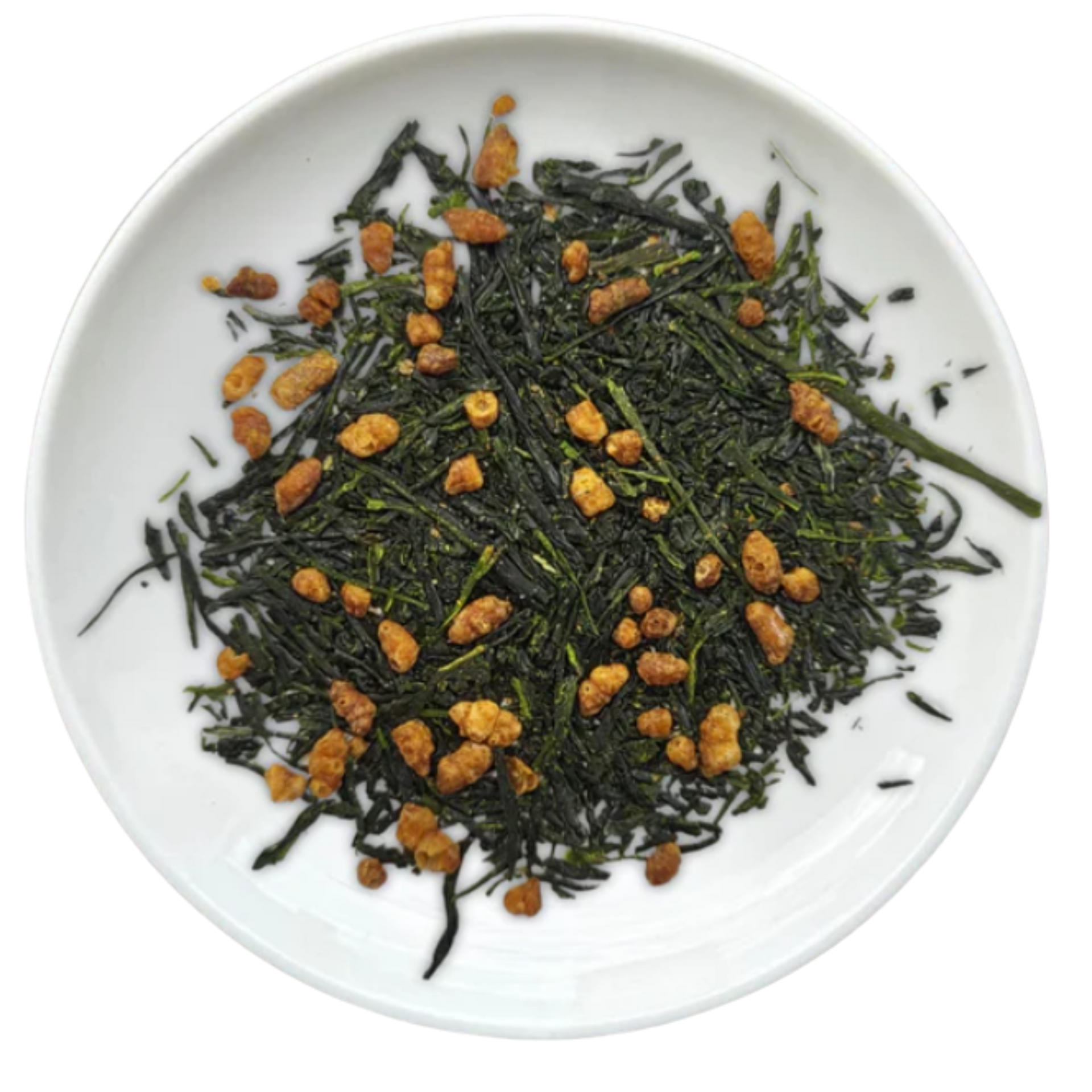 Green Genmaicha tea leaves with roasted rice on a white plate