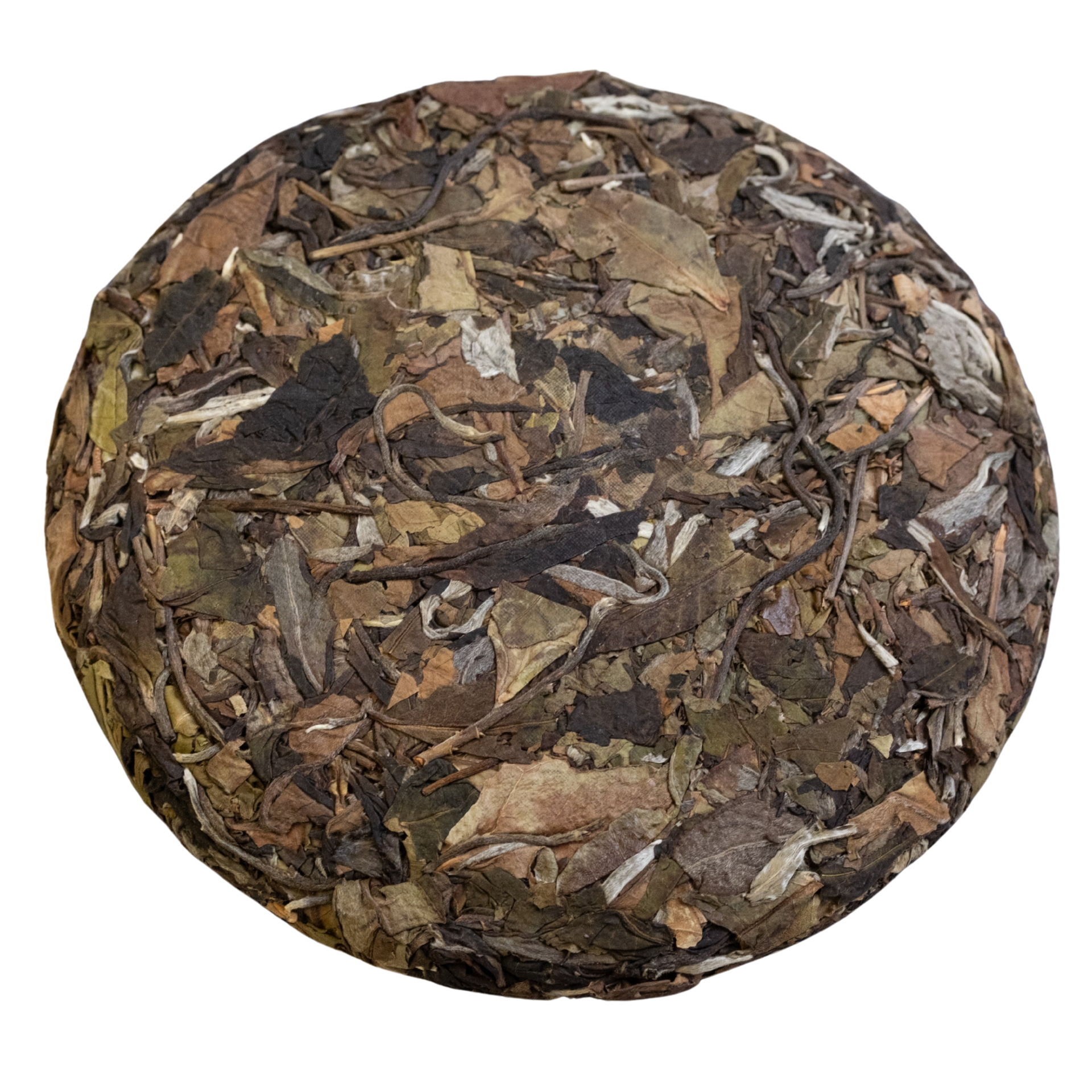 Round compressed white tea cake with various leaf textures