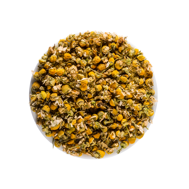 Dried chamomile flowers in a white bow