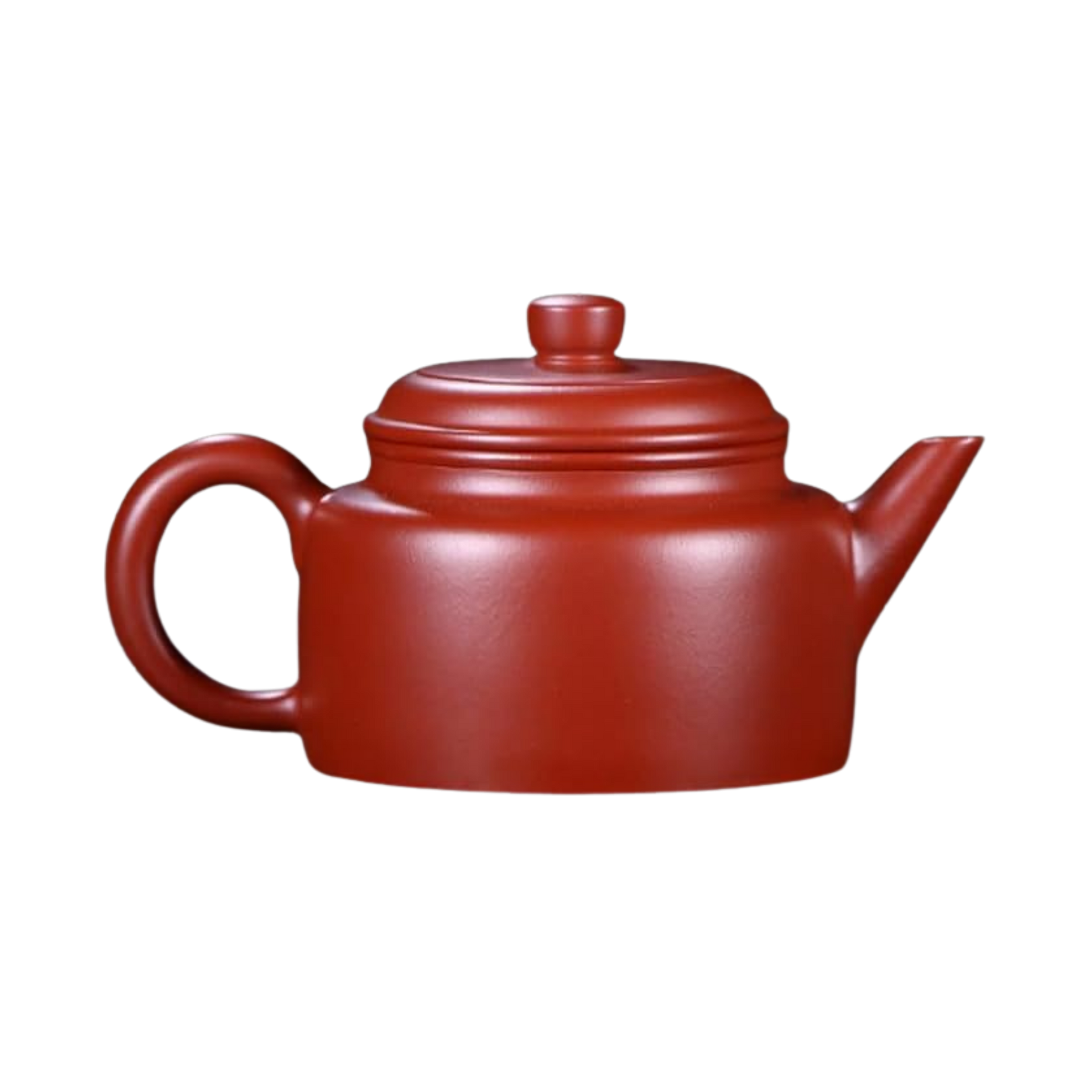 Red ceramic Yixing teapot seen from side