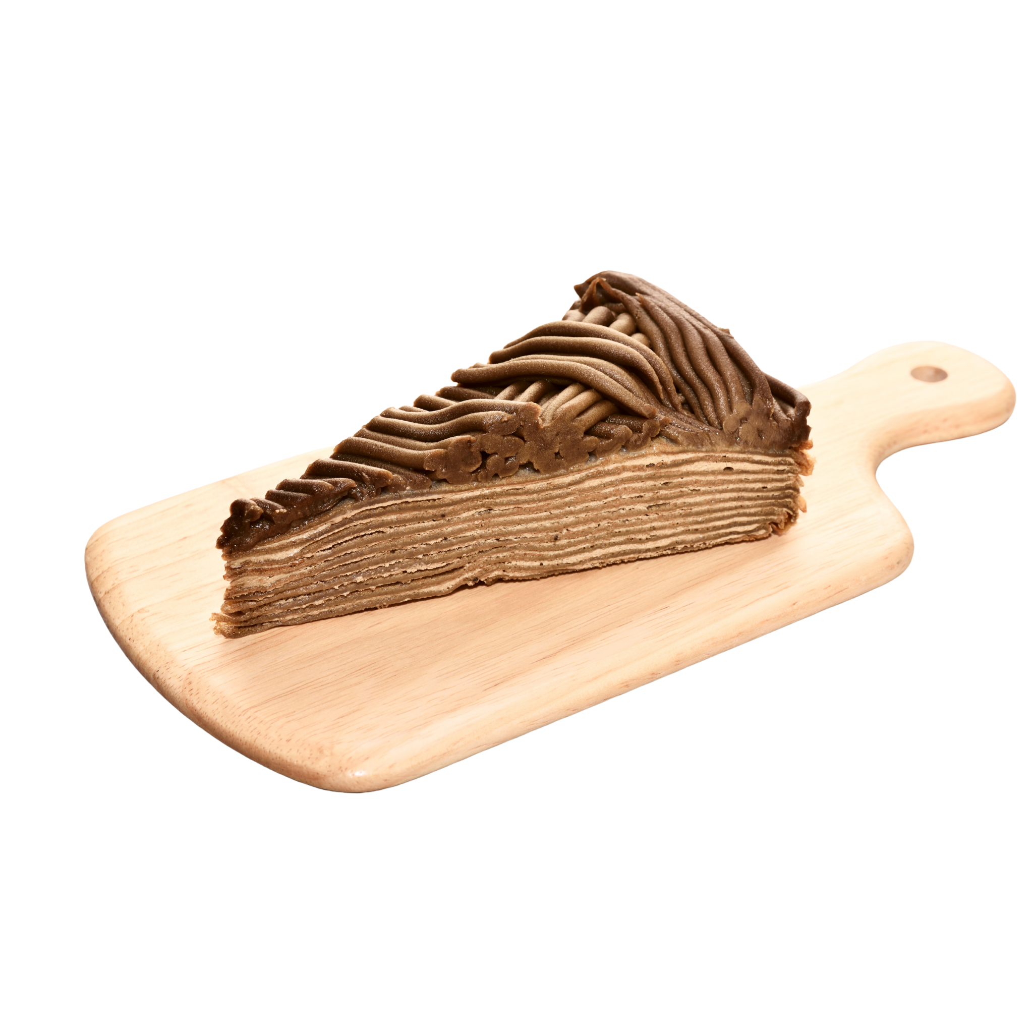 A slice of Hojicha mille crème cake with piped chocolate frosting on top, presented on a light wooden serving board