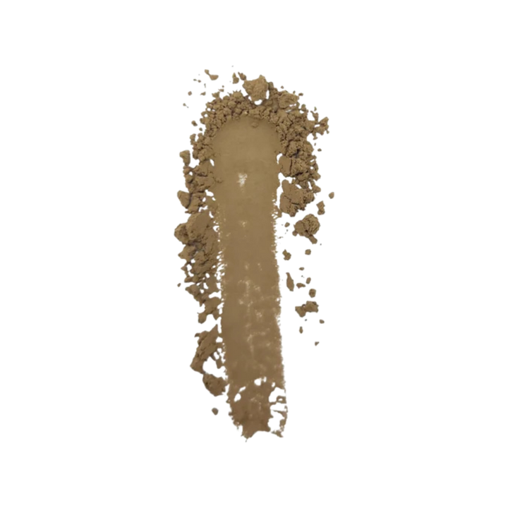 A vertical smear of finely ground Hojicha powder in a warm taupe-brown shade