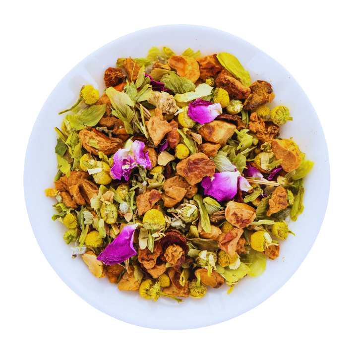 Colorful herbs and flowers in a white bowl