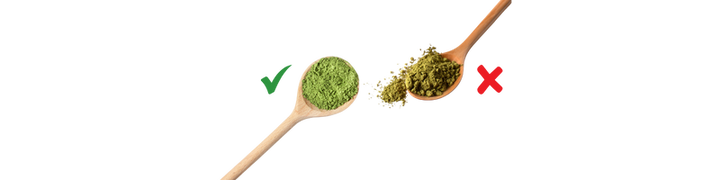 Two wooden spoons with good quality matcha and bad quality matcha