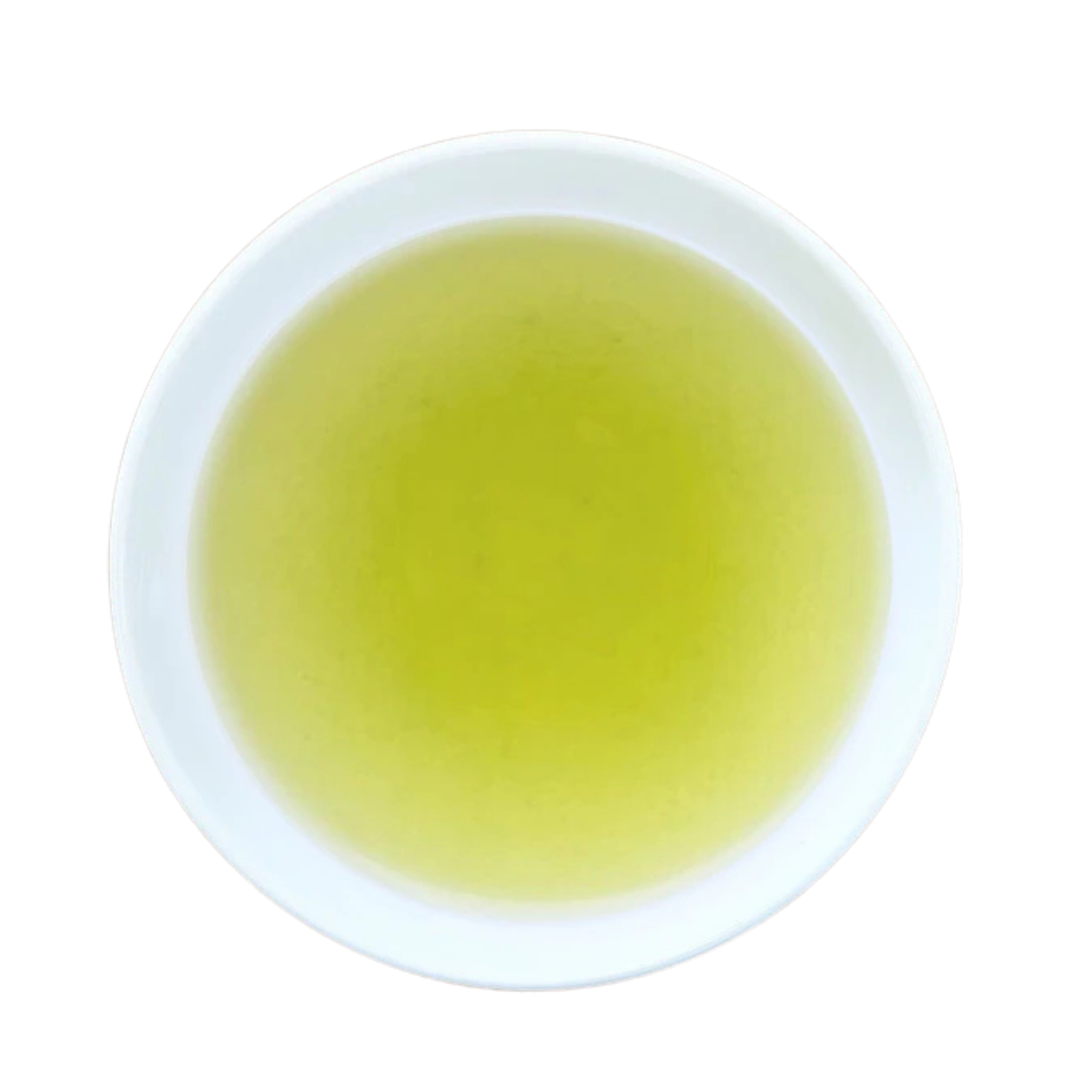 A top-down view of a white ceramic cup filled with yellow-green tea