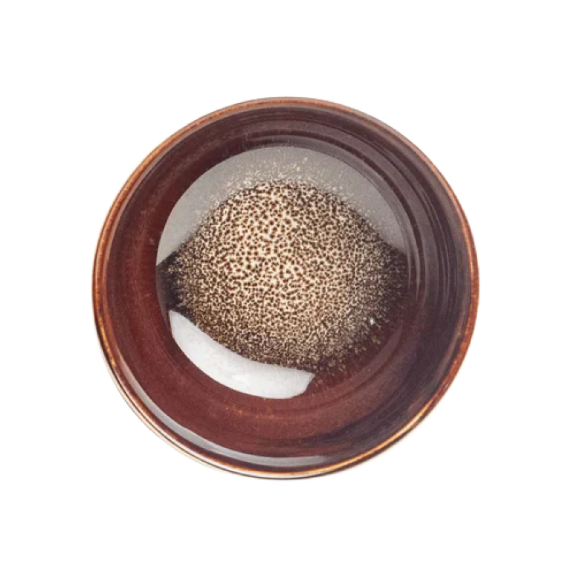 Japanese brown ceramic Matcha bowl with a textured pattern at the bottom