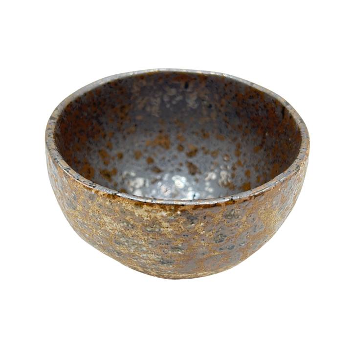 Japanese brown ceramic Matcha bowl with rough earthy surface and black-brown dotted inside
