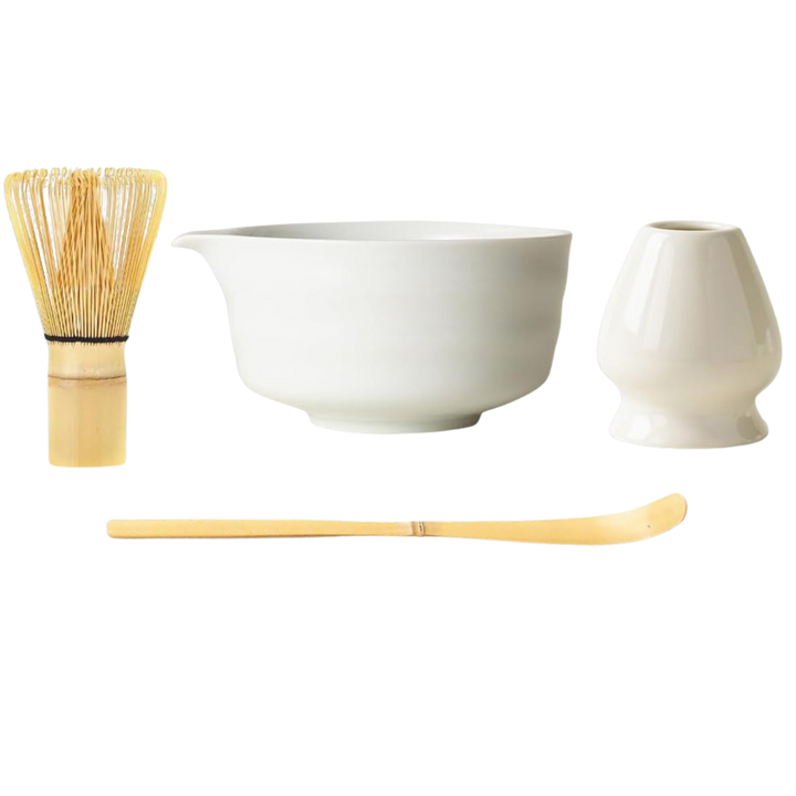 Japanese Matcha set with a white bowl, a bamboo whisk, a spoon and a whisk holder