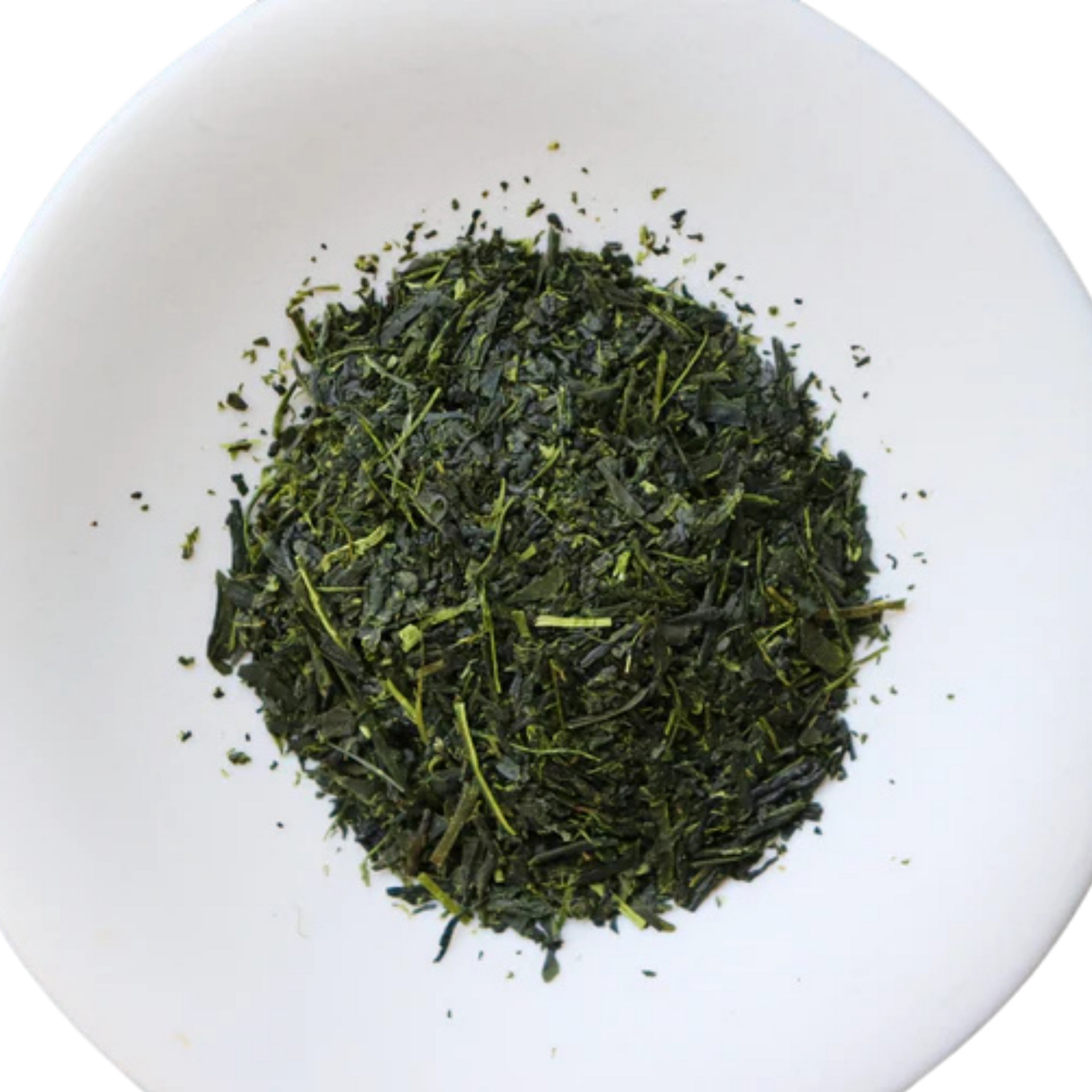 A pile of loose-leaf dark green Sencha tea leaves with a few lighter green stems, presented in a round white dish
