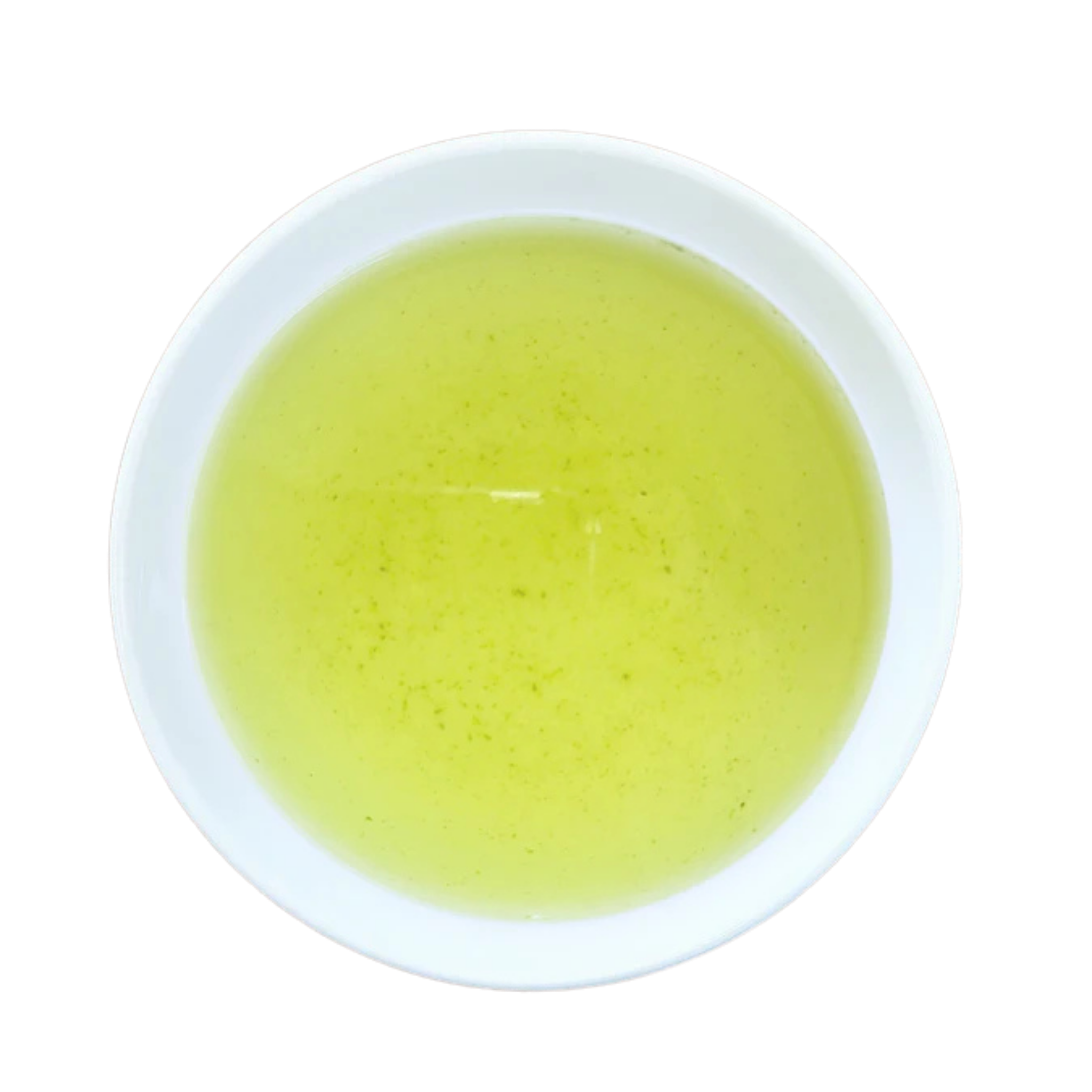 A top-down view of a light yellow-green tea presented in a white ceramic bowl