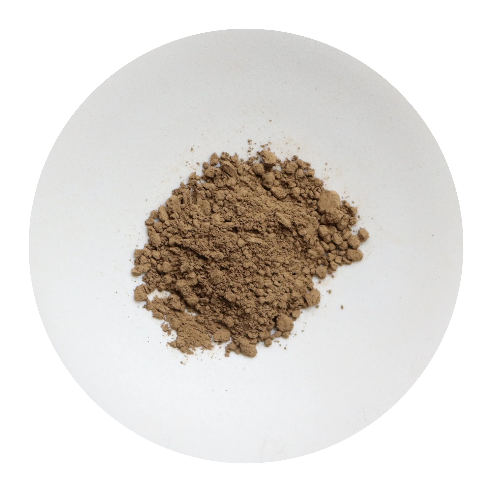 A small mound of fine brown hojicha powder centered on a plain white circular plate