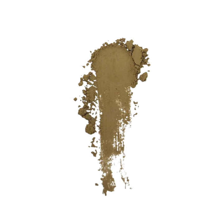 A textured smear of warm tan-brown hojicha powder
