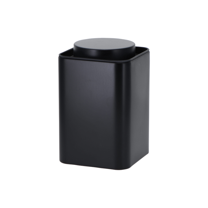 Black rectangular tea can with a round lid 