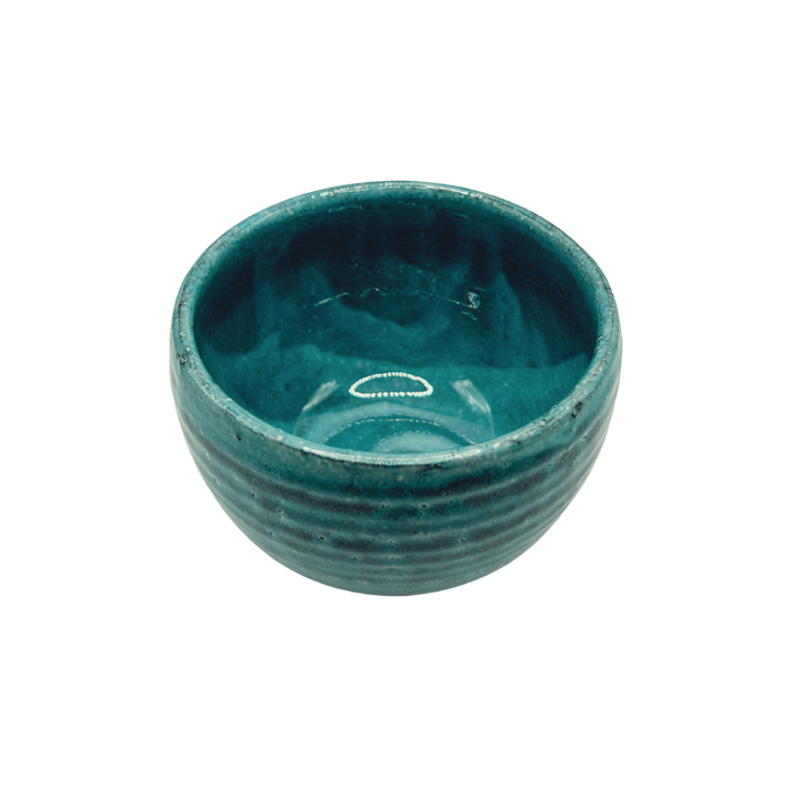 Japanese turquoise handmade ceramic Matcha bowl seen from above