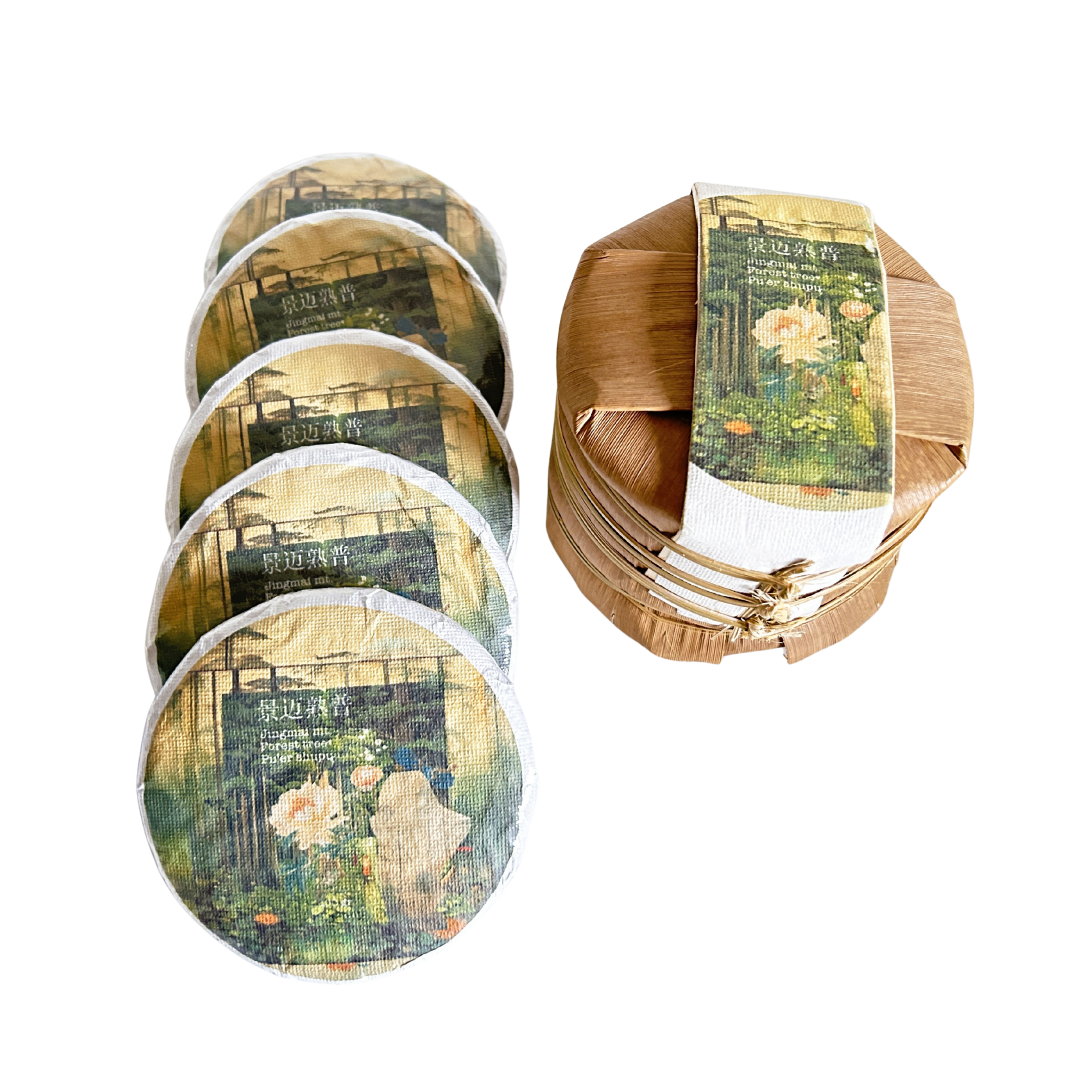 Tea cakes and a round tea tong with artistic designs